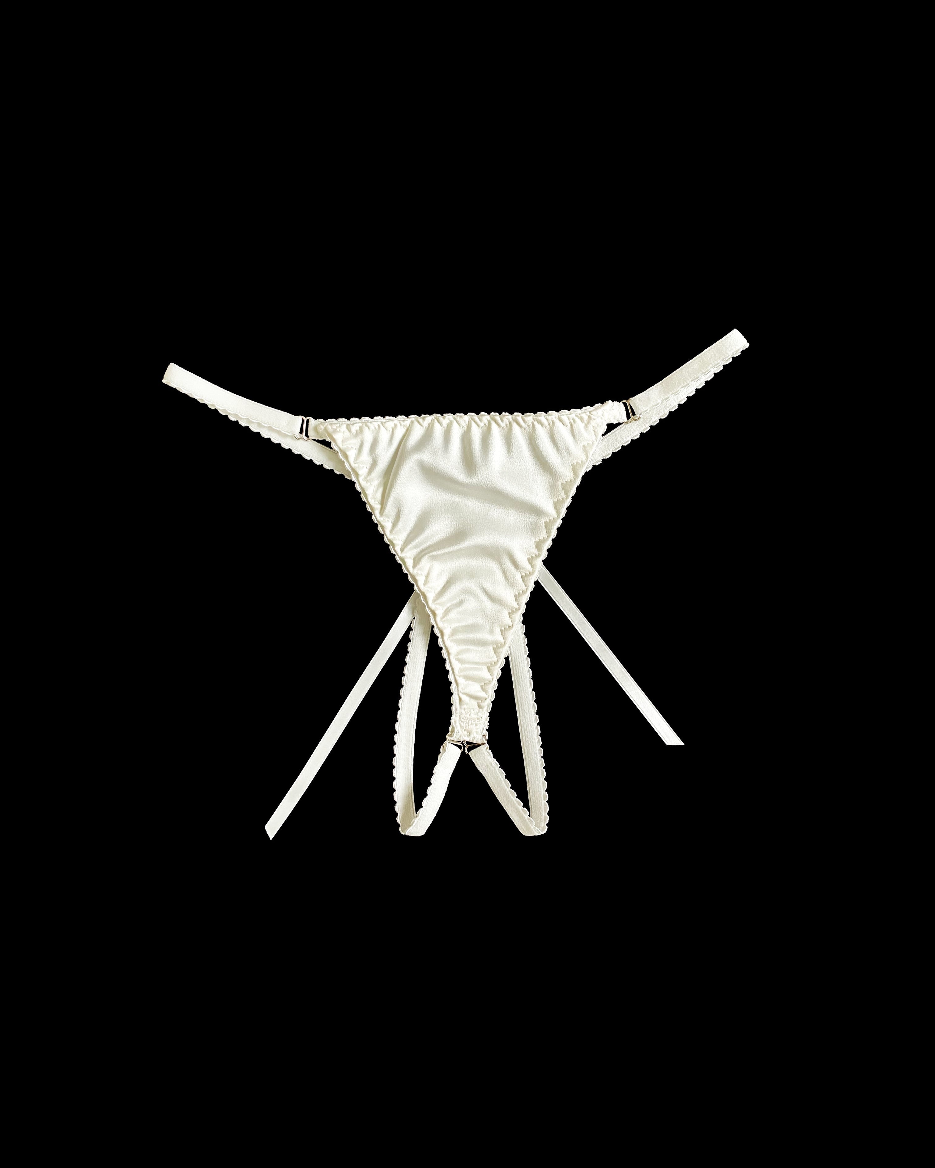 White thong on a black background