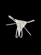 White thong on a black background
