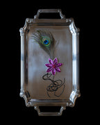 Crevette handmade decorative lingerie pin featuring a vibrant magenta beaded appliqué and an elegant peacock feather.