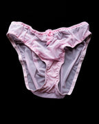Tenera handmade Italian bikini brief in hibiscus pink stretch mesh, featuring delicate handmade appliqués and sparkling Swarovski crystal embellishments.