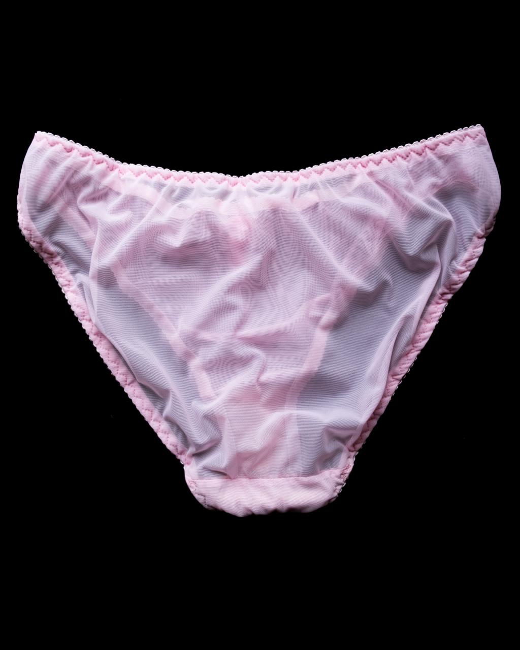 Tenera handmade Italian bikini brief in hibiscus pink stretch mesh, featuring delicate handmade appliqués and sparkling Swarovski crystal embellishments.